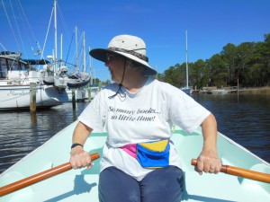 Anne rowing Enid on Whittaker Creek